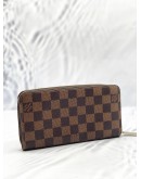 LOUIS VUITTON CHRISTMAS ANIMATION COLLECTION ZIPPY WALLET IN BROWN DAMIER EBENE CANVAS