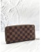 LOUIS VUITTON CHRISTMAS ANIMATION COLLECTION ZIPPY WALLET IN BROWN DAMIER EBENE CANVAS