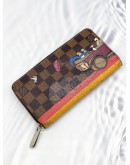 LOUIS VUITTON CHRISTMAS ANIMATION COLLECTION ZIPPY WALLET IN BROWN DAMIER EBENE CANVAS