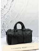 LOUIS VUITTON KEEPALL BANDOULIERE 25 BAG IN BLACK MONOGRAM TAURILLON LEATHER 