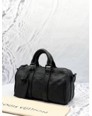 LOUIS VUITTON KEEPALL BANDOULIERE 25 BAG IN BLACK MONOGRAM TAURILLON LEATHER 