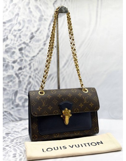 LOUIS VUITTON VICTOIRE SHOULDER BAG IN BROWN MONOGRAM CANVAS WITH DARK BLUE CALFSKIN LEATHER