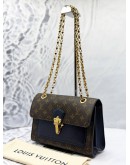 LOUIS VUITTON VICTOIRE SHOULDER BAG IN BROWN MONOGRAM CANVAS WITH DARK BLUE CALFSKIN LEATHER