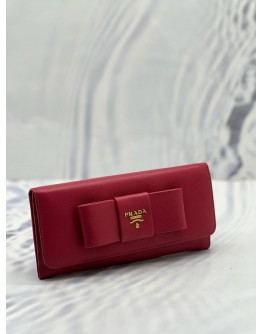 PRADA BOW CONTINENTAL WALLET IN PINK SAFFIANO LEATHER