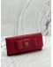 PRADA BOW CONTINENTAL WALLET IN PINK SAFFIANO LEATHER