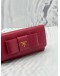 PRADA BOW CONTINENTAL WALLET IN PINK SAFFIANO LEATHER