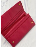 PRADA BOW CONTINENTAL WALLET IN PINK SAFFIANO LEATHER