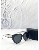 PRADA PR 14WS CAT-EYE SUNGLASSES IN BLACK AND TALC WITH DARK GREY LENSES