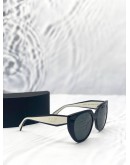 PRADA PR 14WS CAT-EYE SUNGLASSES IN BLACK AND TALC WITH DARK GREY LENSES