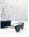 PRADA PR 14WS CAT-EYE SUNGLASSES IN BLACK AND TALC WITH DARK GREY LENSES