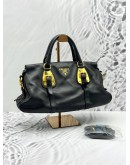 PRADA BAULETTO TOP HANDLE AND SHOULDER BAG IN BLACK CALFSKIN LEATHER