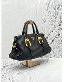 PRADA BAULETTO TOP HANDLE AND SHOULDER BAG IN BLACK CALFSKIN LEATHER