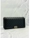 (LIKE NEW) CHANEL BOY CLUTCH IN BLACK LAMBSKIN LEATHER