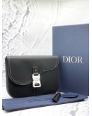 (UNUSED) CHRISTIAN DIOR BLACK GRAINED CALFSKIN CLUTCH WITH CD BUCKLE