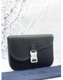 (UNUSED) CHRISTIAN DIOR BLACK GRAINED CALFSKIN CLUTCH WITH CD BUCKLE