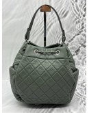 CHANEL SMALL BUCKET BAG IN GREEN LAMBSKIN LEATHER
