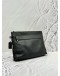 COACH POUCH IN BLACK PEBBLED LEATHER