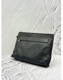 COACH POUCH IN BLACK PEBBLED LEATHER
