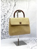 CHANEL VINTAGE KELLY WOODEN TOP HANDLE BAG IN BEIGE CANVAS 