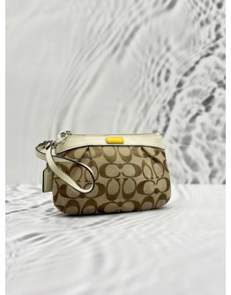 COACH POUCH IN BEIGE CC CANVAS AND IVORY CALFSKIN LEATHER