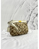 COACH POUCH IN BEIGE CC CANVAS AND IVORY CALFSKIN LEATHER