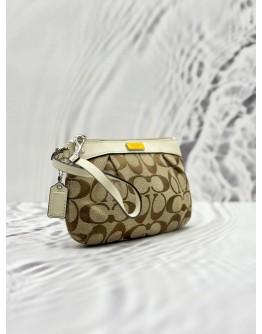 COACH POUCH IN BEIGE CC CANVAS AND IVORY CALFSKIN LEATHER