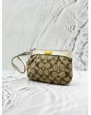 COACH POUCH IN BEIGE CC CANVAS AND IVORY CALFSKIN LEATHER