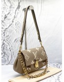 (LIKE NEW) LOUIS VUITTON FAVORITE WITH REMOVABLE AND ADJUSTABLE STRAP IN TOURTELLE AND CREAM BICOLOR MONOGRAM EMPREINTE LEATHER -FULL SET-