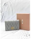 MIU MIU MATELASSE NAPPA LEATHER WALLET IN GREY