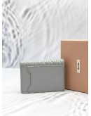 MIU MIU MATELASSE NAPPA LEATHER WALLET IN GREY