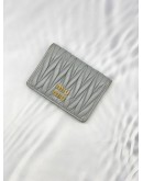 MIU MIU MATELASSE NAPPA LEATHER WALLET IN GREY