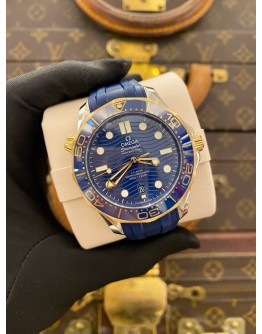 (UNUSED) 2023 OMEGA SEAMASTER DIVER 300M 18K 750 YELLOW GOLD BEZEL REF 210.22.42.20.03.001 BLUE DIAL 42MM AUTOMATIC WATCH -FULL SET-