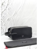 TUMI TURIN STEPHANO CLUTCH IN BLACK LEATHER 