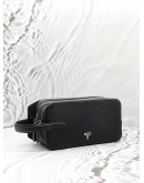 TUMI TURIN STEPHANO CLUTCH IN BLACK LEATHER 