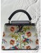 MICROCHIP LOUIS VUITTON CAPUCINES BB IN METALLIC SILVER CALFSKIN LEATHER WITH PRINTED FLORAL MOTIF