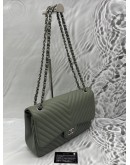 CHANEL JUMBO CLASSIC CHEVRON DOUBLE FLAP BAG IN LIGHT OLIVE GREEN CAVIAR LEATHER