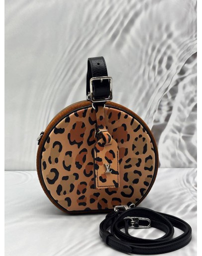 LOUIS VUITTON PETITE BOITE CHAPEAU IN MULTICOLOR MONOGRAM REVERSE CANVAS WITH PRINTED LEOPARD