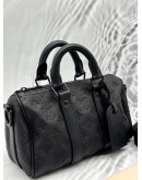 LOUIS VUITTON KEEPALL BANDOULIERE 25 IN BLACK MONOGRAM TAURILLON LEATHER