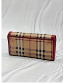 BURBERRY LONG FLAP WALLET IN BEIGE HAYMARKET CHECK CANVAS WITH BURGUNDY LEATHER
