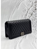 CHANEL BOY CLUTCH IN BLACK LAMBSKIN LEATHER