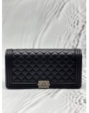 CHANEL BOY CLUTCH IN BLACK LAMBSKIN LEATHER