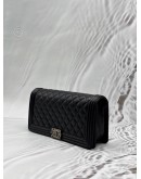 CHANEL BOY CLUTCH IN BLACK LAMBSKIN LEATHER