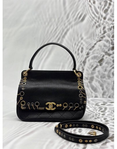 CHANEL PIERCING CHIC FLAP BAG IN BLACK CAVIAR LEATHER