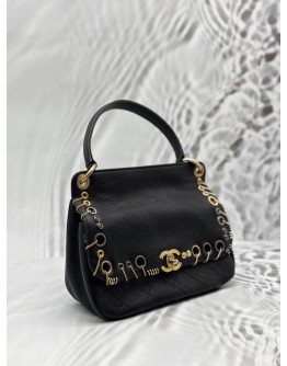 CHANEL PIERCING CHIC FLAP BAG IN BLACK CAVIAR LEATHER