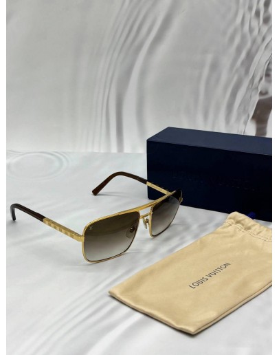 LOUIS VUITTON ATTITUDE SUNGLASSES IN BROWN WITH GOLD