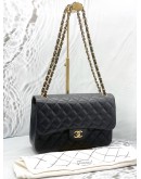 CHANEL CLASSIC JUMBO DOUBLE FLAP SHOULDER BAG IN BLACK CAVIAR LEATHER