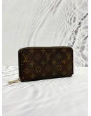 LOUIS VUITTON ZIPPY WALLET IN BROWN MONOGRAM CANVAS