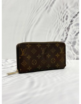 LOUIS VUITTON ZIPPY WALLET IN BROWN MONOGRAM CANVAS