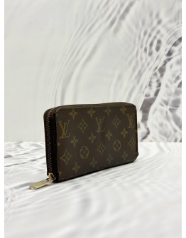 LOUIS VUITTON ZIPPY WALLET IN BROWN MONOGRAM CANVAS