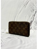 LOUIS VUITTON ZIPPY WALLET IN BROWN MONOGRAM CANVAS